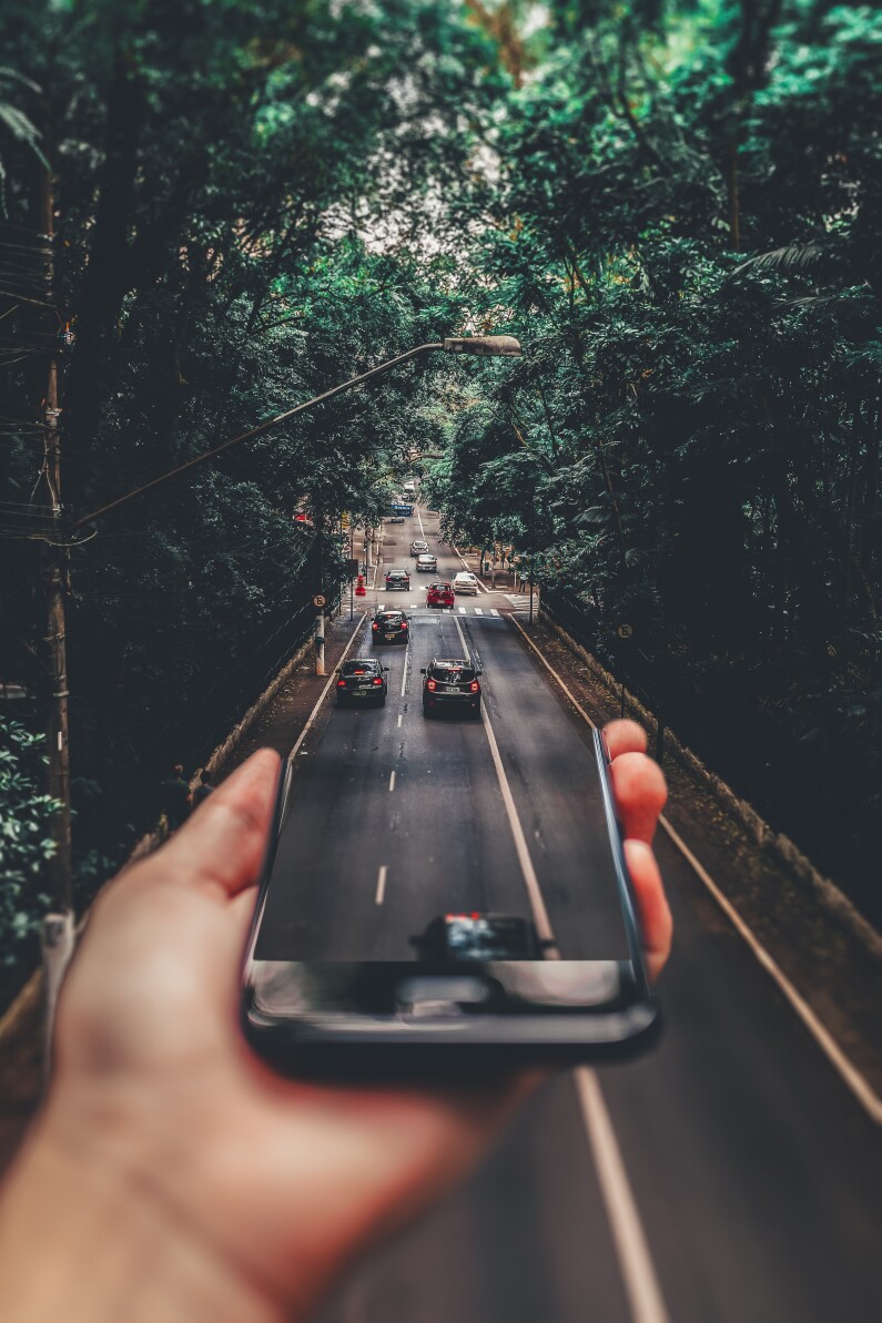 forced perspective photography of cars running on road below 799443